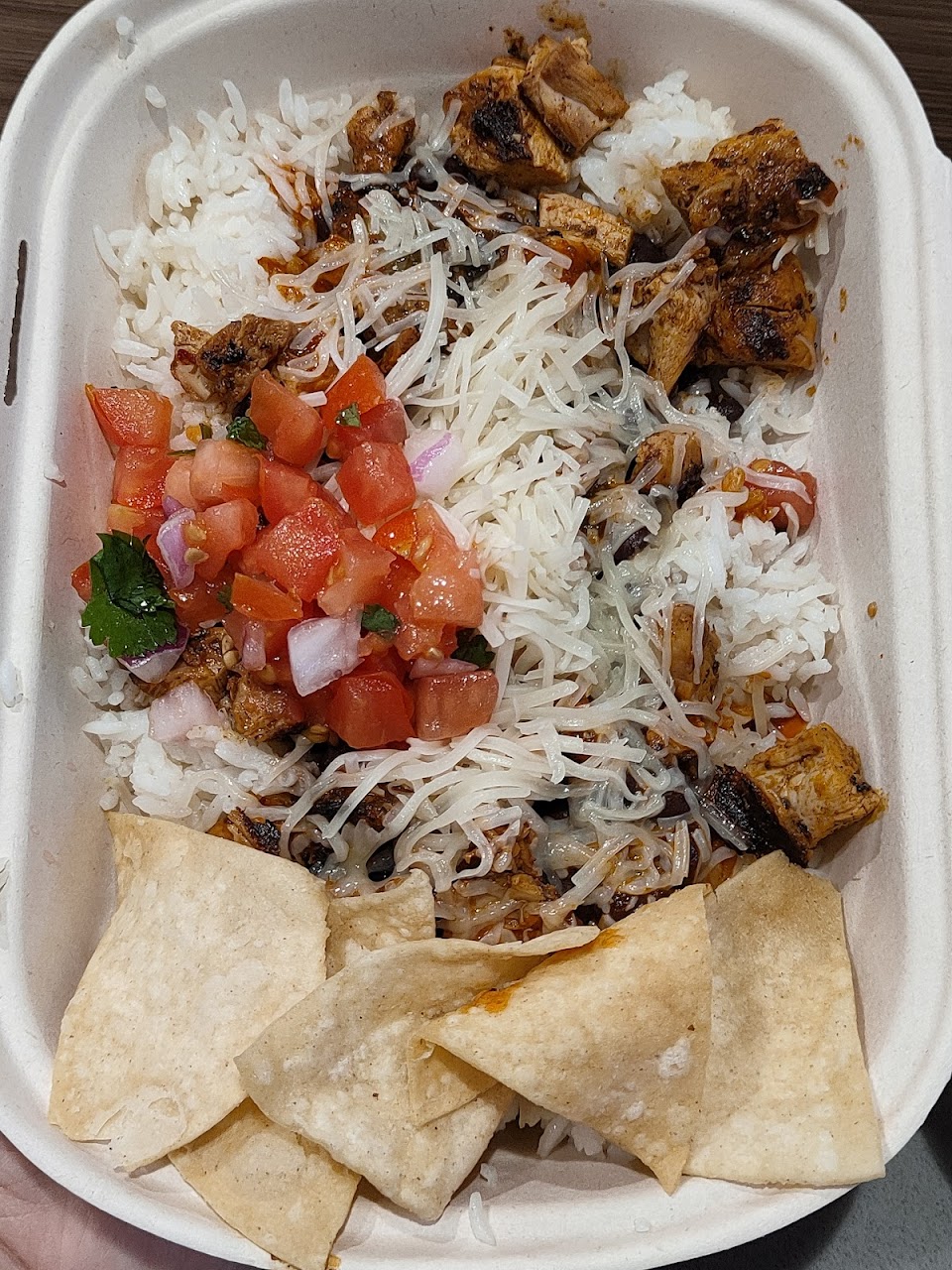 Nachos with salsa, cheese, and corn chips at Guzman y Gomez Toowong Village