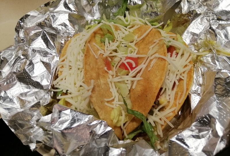 Soft taco with lettuce, salsa, and guacamole at Guzman y Gomez Toowong Village